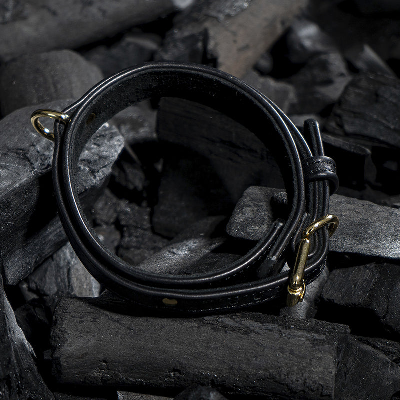 Dog Black Collar with Soft Suede on Coals Top View
