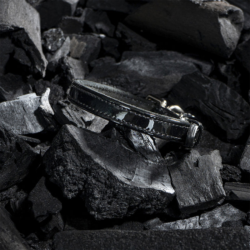 Black leather collar photo on charcoal